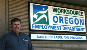 Earl Howard in front of the Employment Department Office.